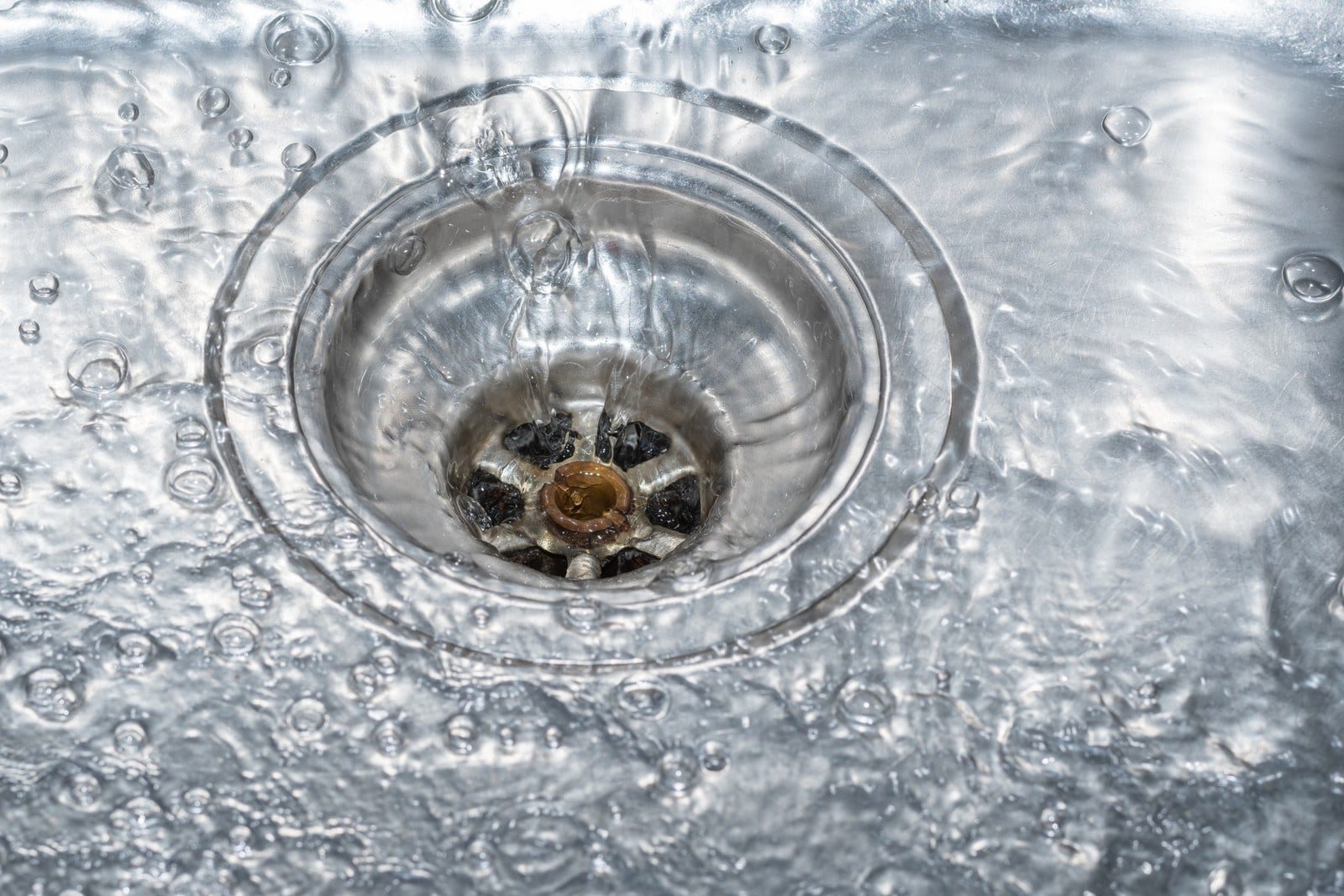 What Causes Slow Draining Kitchen Sink